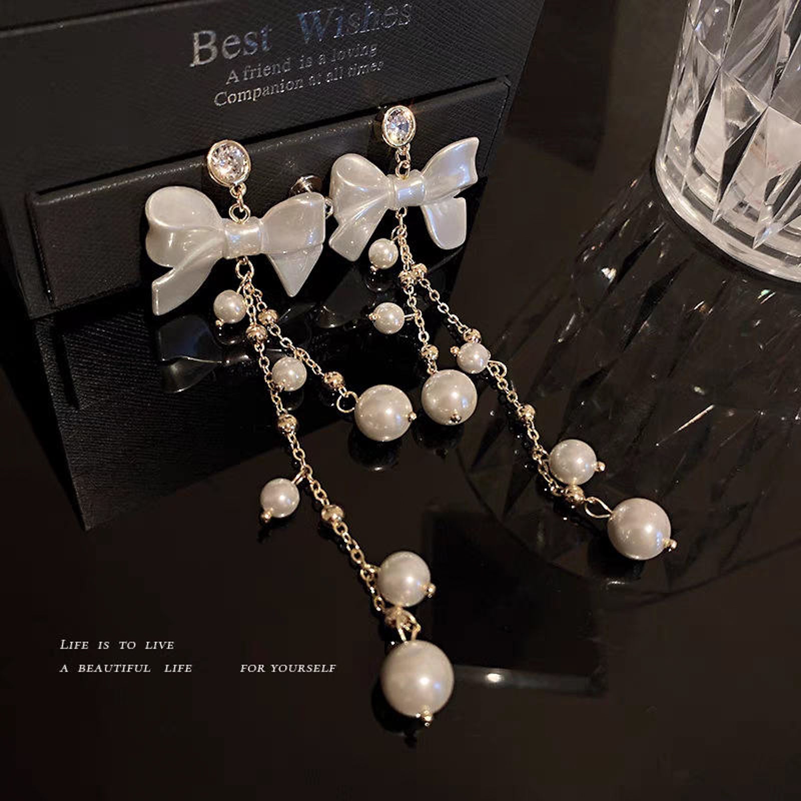 White Bow Pearl Chain Earrings for Women – Elegant Gold Dangle Design