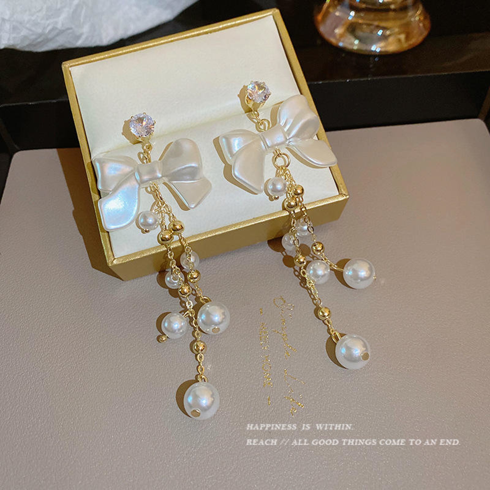 White Bow Pearl Chain Earrings for Women – Elegant Gold Dangle Design