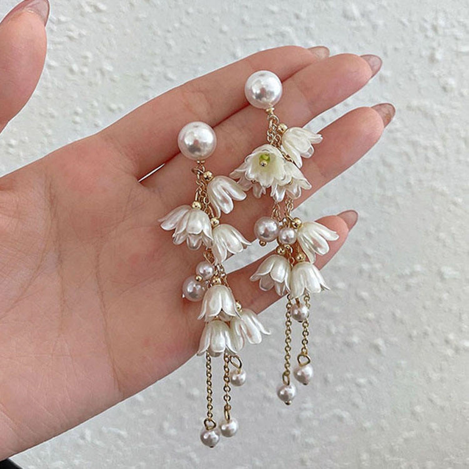 White Floral Pearl Long Dangler Earrings for Women | Gold Finish Imitation Jewellery | Elegant Party Wear