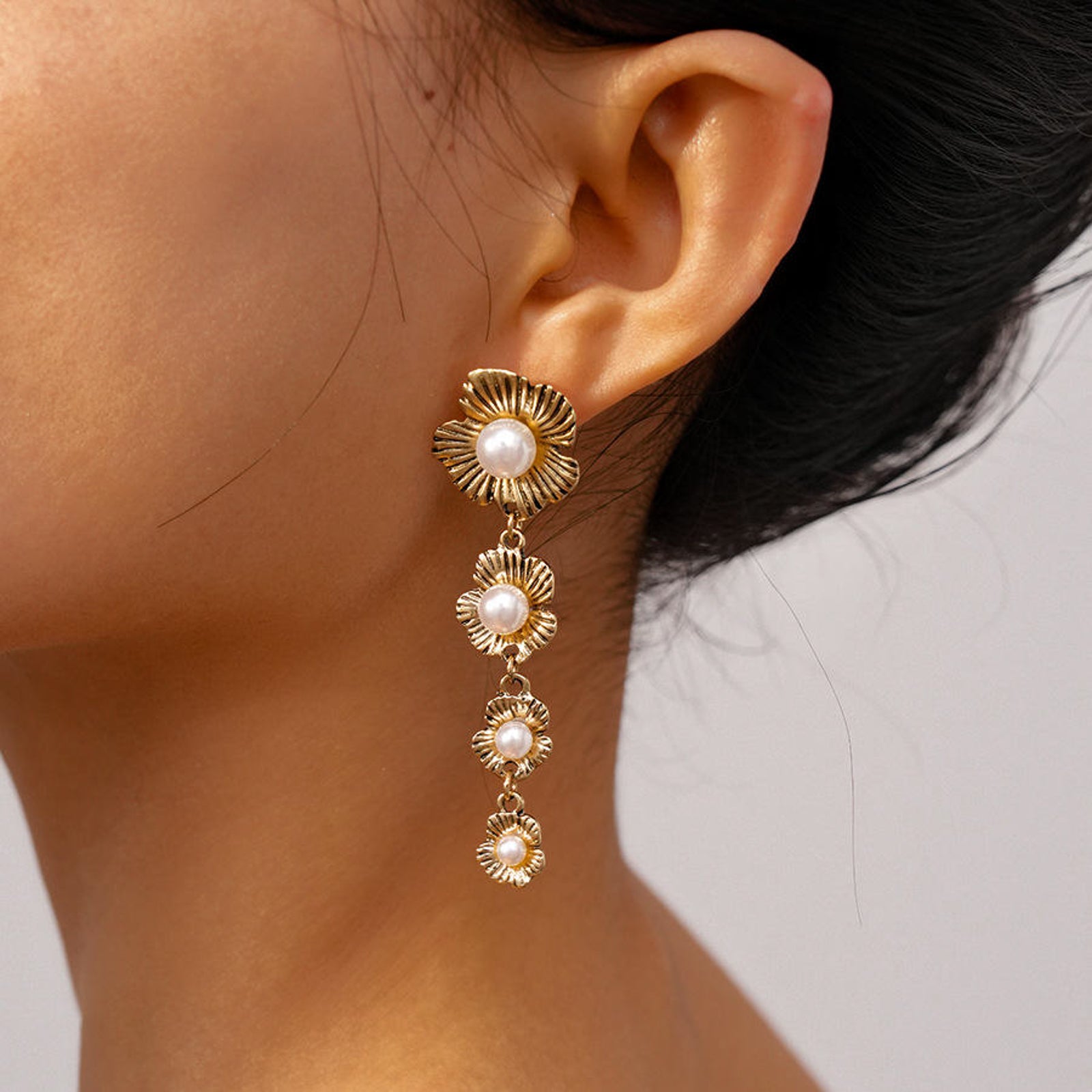Gold Floral Drop Earrings with Cascading Pearl Accents – Elegant Statement Jewelry
