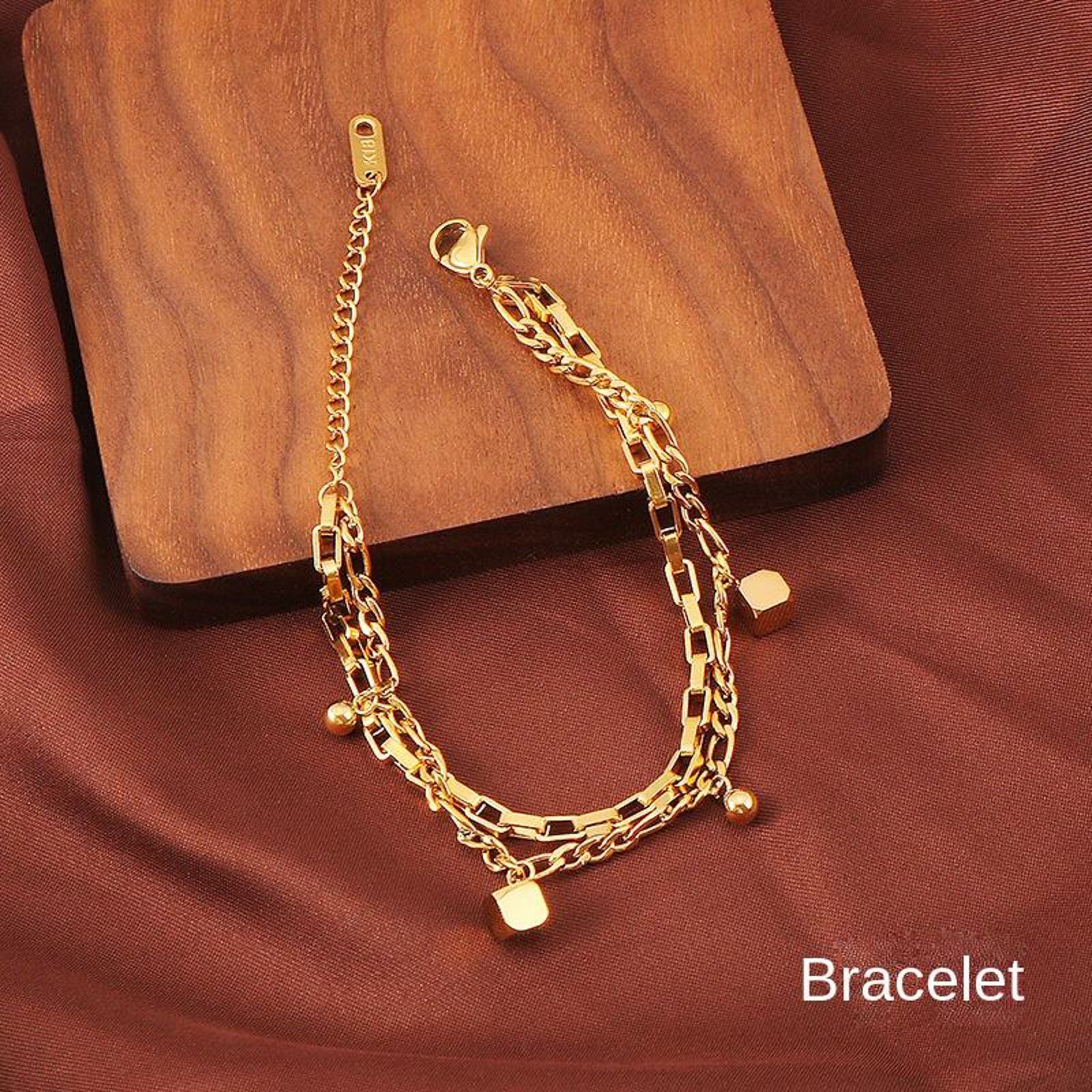 Gold Dual Chain Bracelet with Cube & Sphere Charms – Adjustable Modern Jewelry for Women
