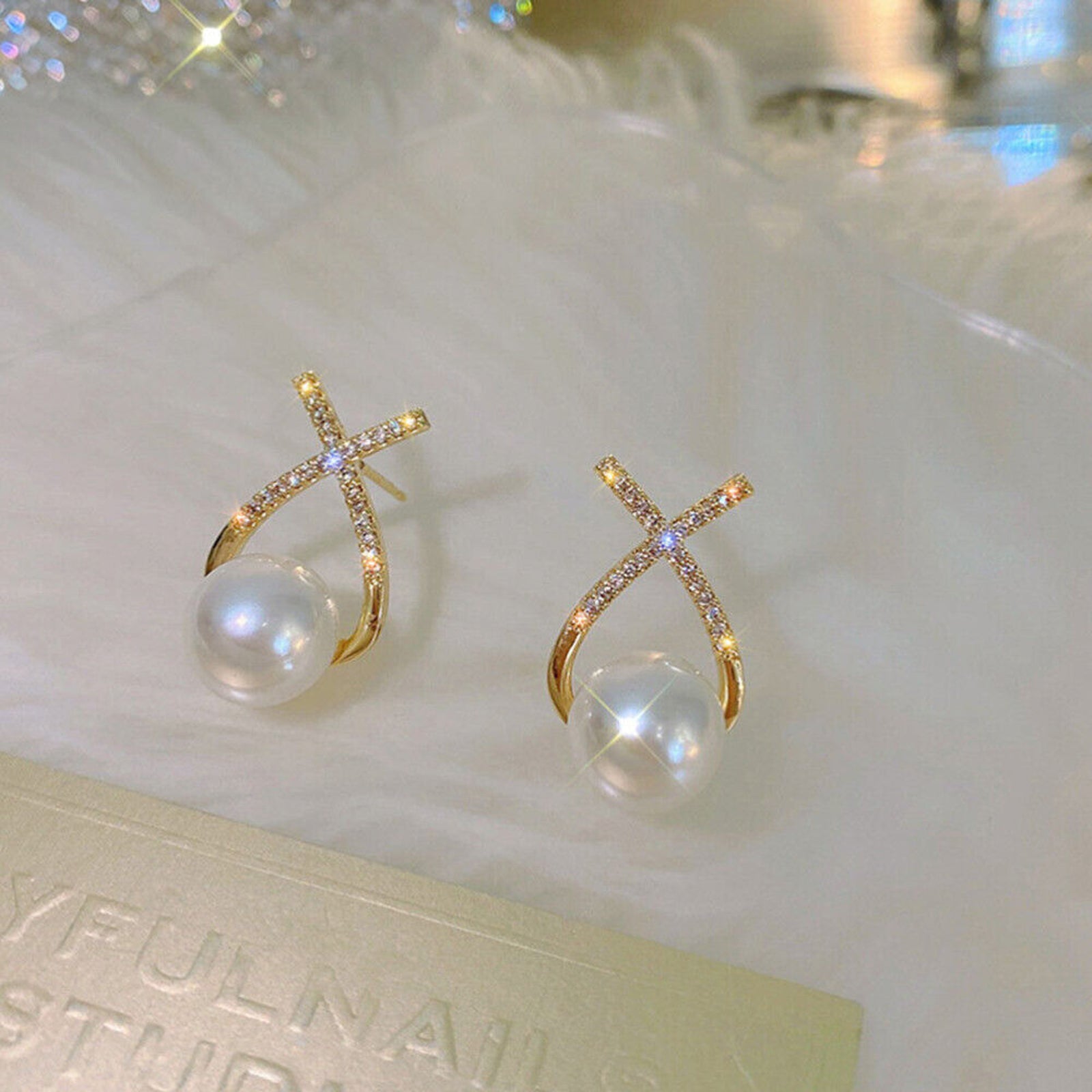 X-Shaped Gold Loop Earrings with White Pearl & Sparkling Stones – Party Wear Jewelry for Women & Girls