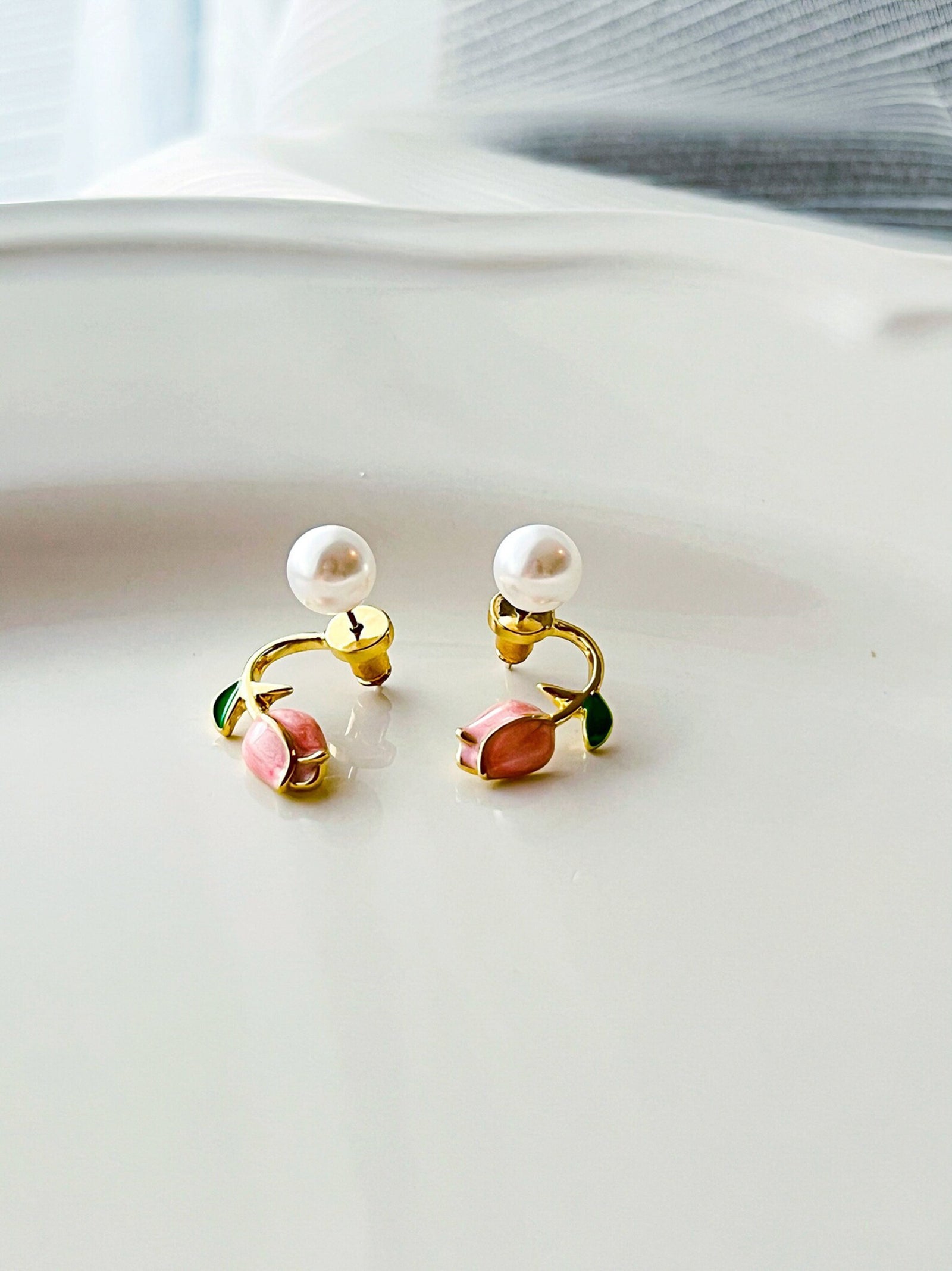 Pearl Rosebud Stud Earrings with Green Leaf Accent