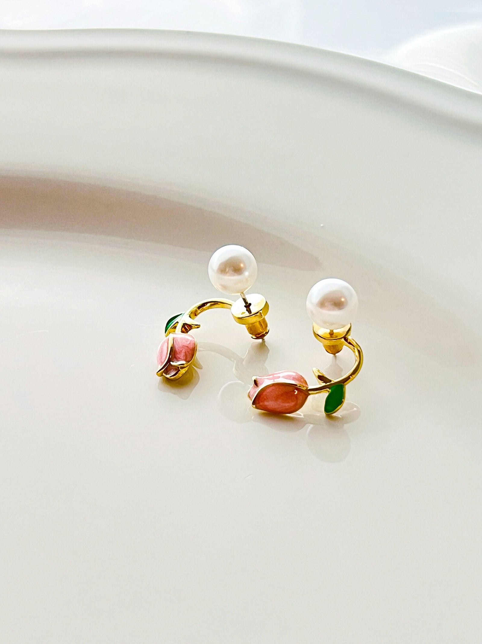 Pearl Rosebud Stud Earrings with Green Leaf Accent